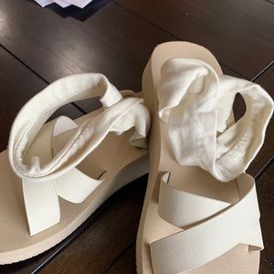 Sanuk highland sling sandals. Squishy, very comfortable shoes.